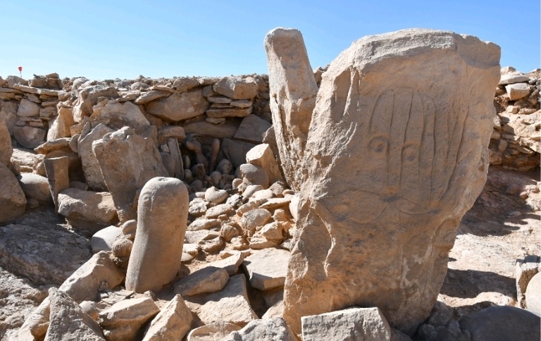 limestone standing stone figurines with human faces