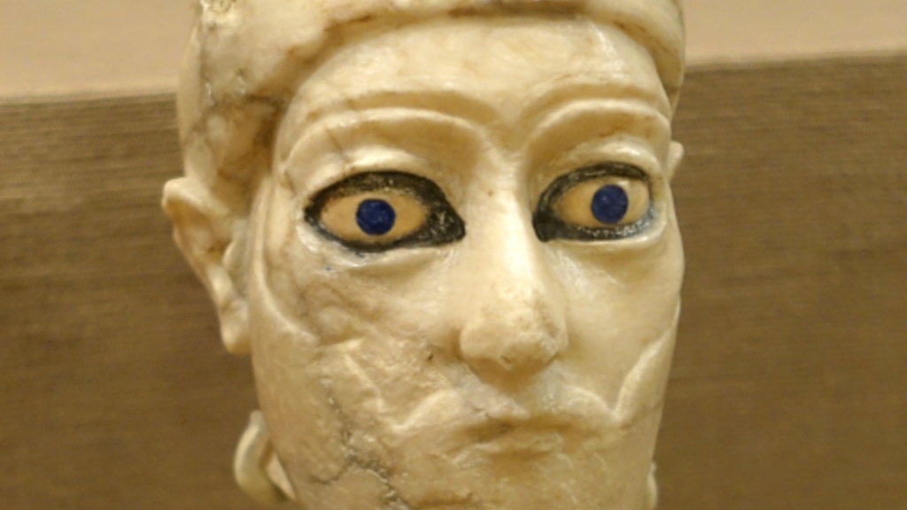 Gypsum head of a ruler with ivory eyes from Bismaya, Iraq