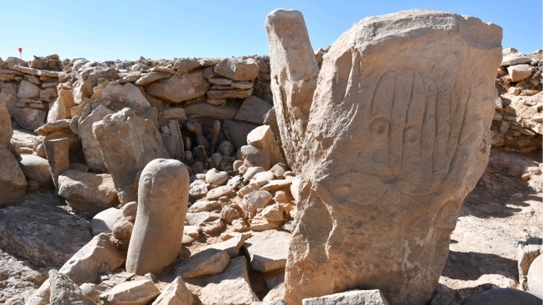 limestone standing stone figurines with human faces